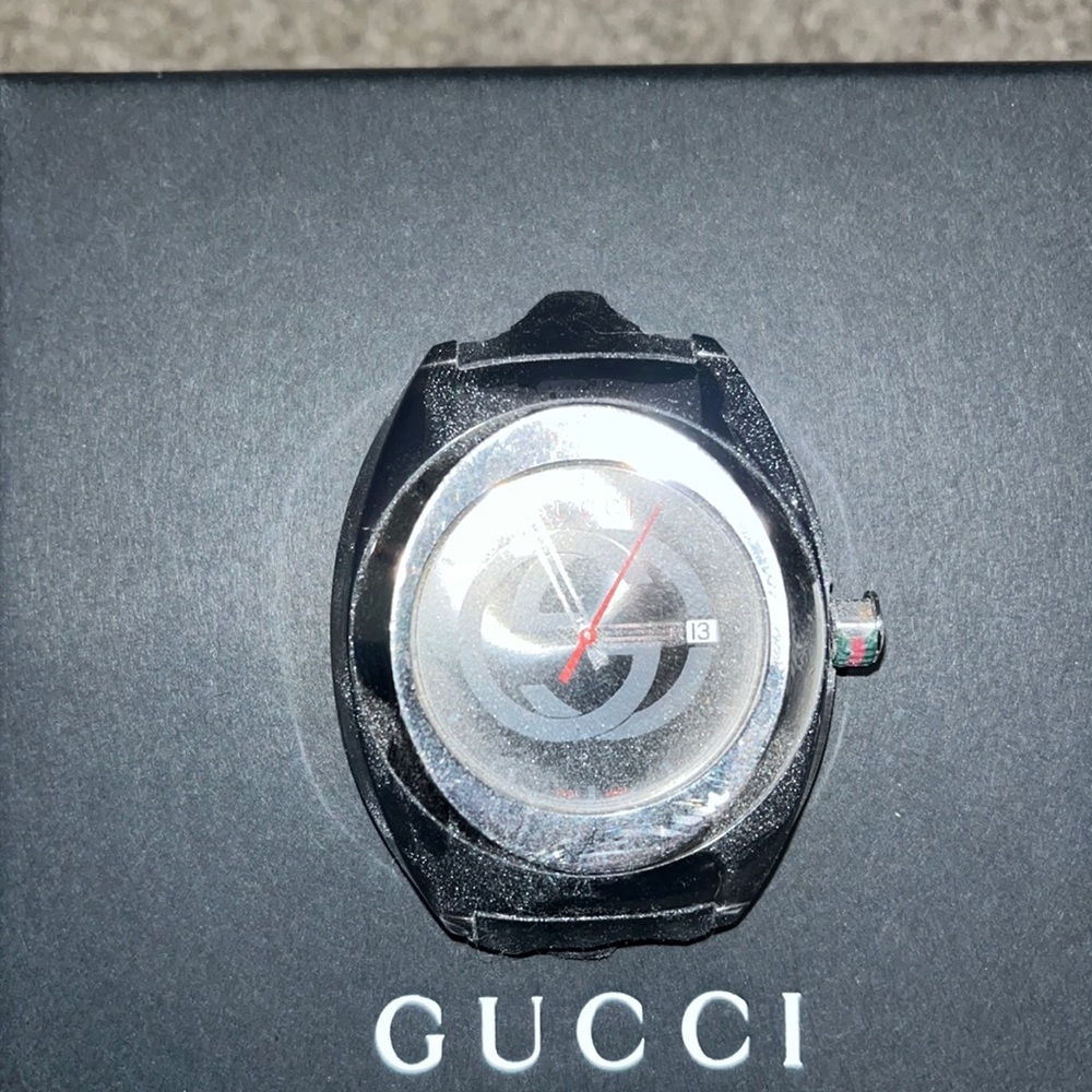 Black authentic Gucci watch. Has 1 black box. Other box is missing.